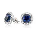 Tanzanite studs in white gold with a diamond halo.